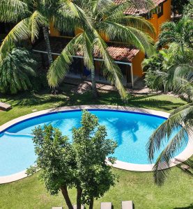 Aerial view of the tropical pool courtyard at Villas Macondo in Tamarindo Costa Rica