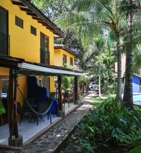 Tropical walkway and guest patios at Villas Macondo in Tamarindo Costa Rica