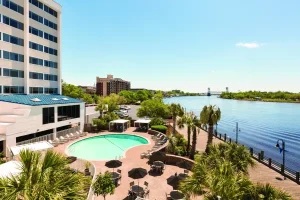 Outdoor swimming pool overlooking the Cape Fear River at Hotel Ballast Wilmington.
